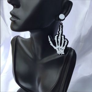 Middle finger skeleton earrings